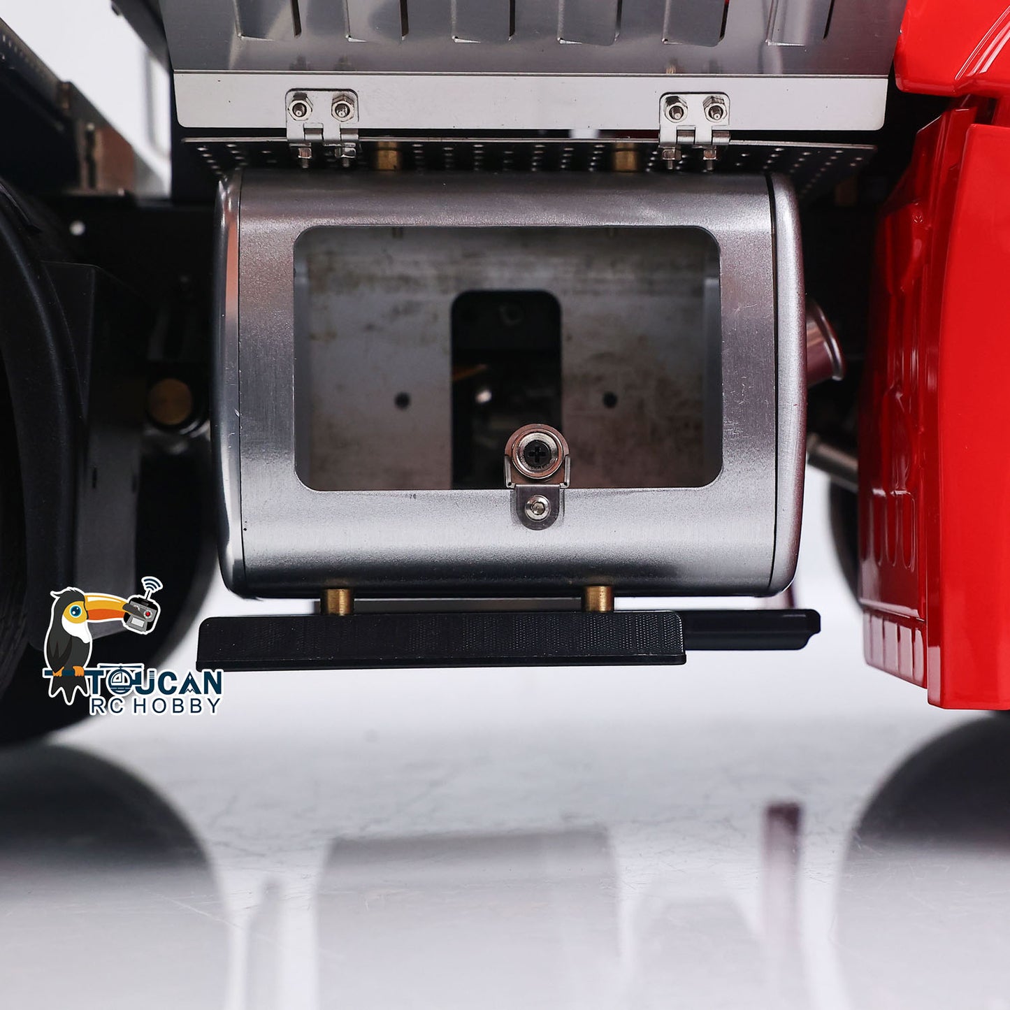 Rear view of 1/14 8x8 metal chassis RC truck with equipment rack and hitch 