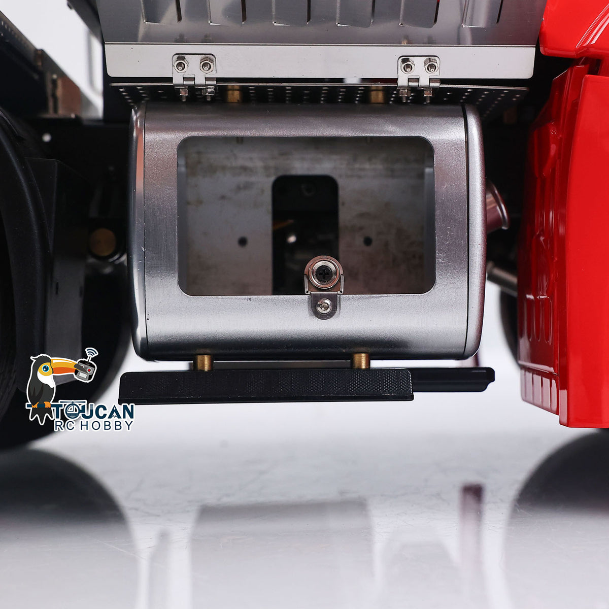 Rear view of 1/14 8x8 metal chassis RC truck with equipment rack and hitch 
