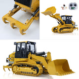 Chassis underside of 1:14 RC hydraulic loader JDM-188 CAT963D, showing motor and metal track drive